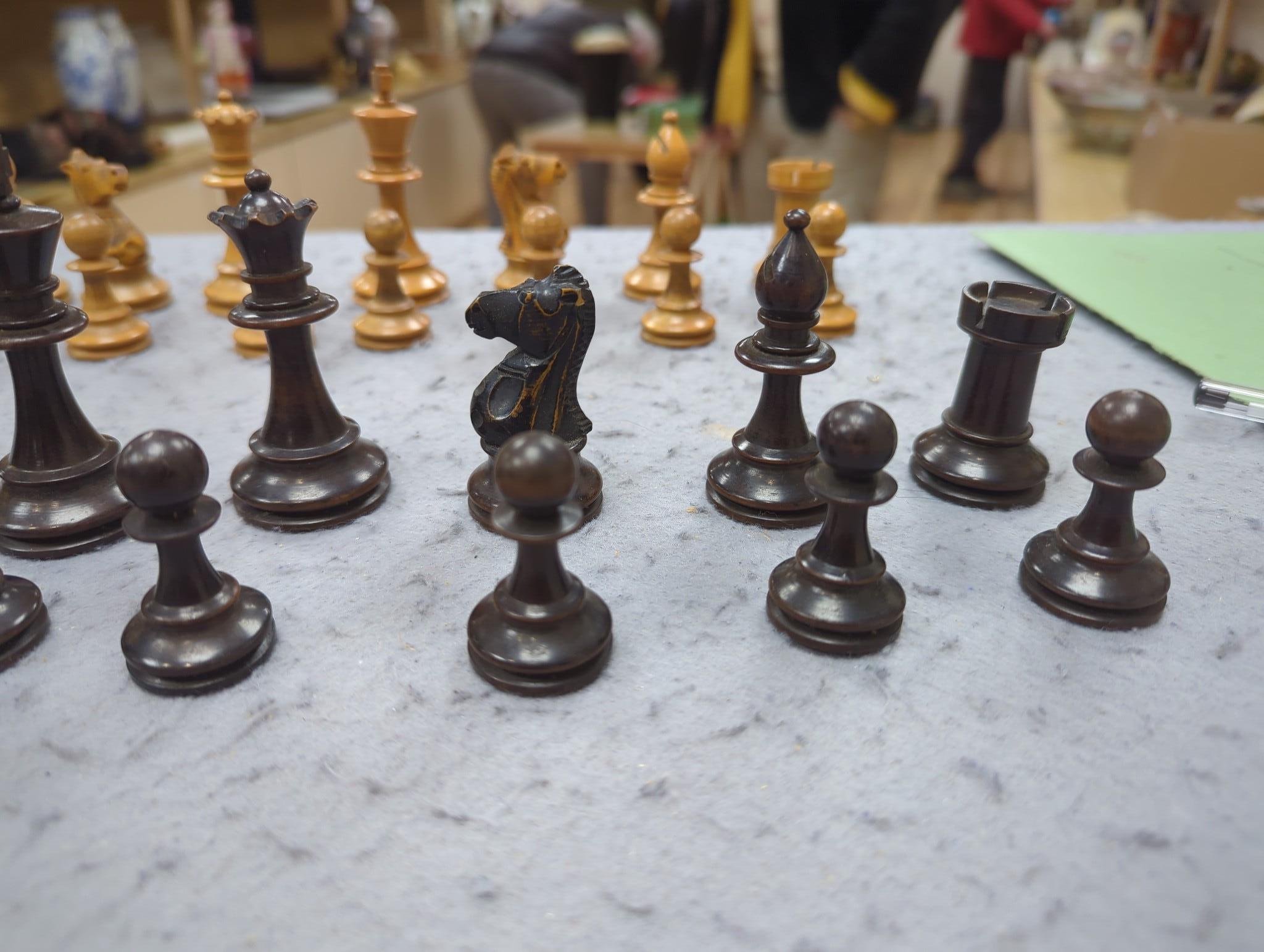 After Mene, a bronze greyhound, a Staunton-pattern chess set and a set of Victorian postal scales, bronze 22cms wide